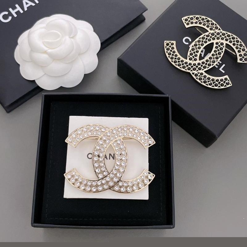 Ch*el brooches